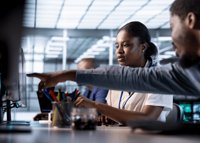 African students participating in digital skills training with mentorship and hands-on learning, representing upskilling Africa’s tech workforce.